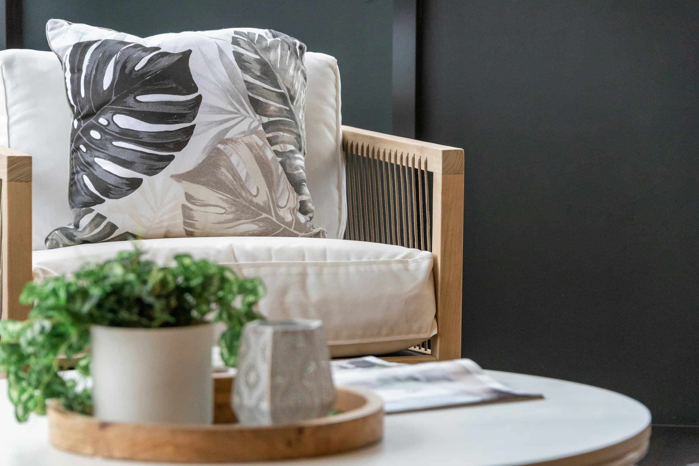 Sofa with cushions and a throw